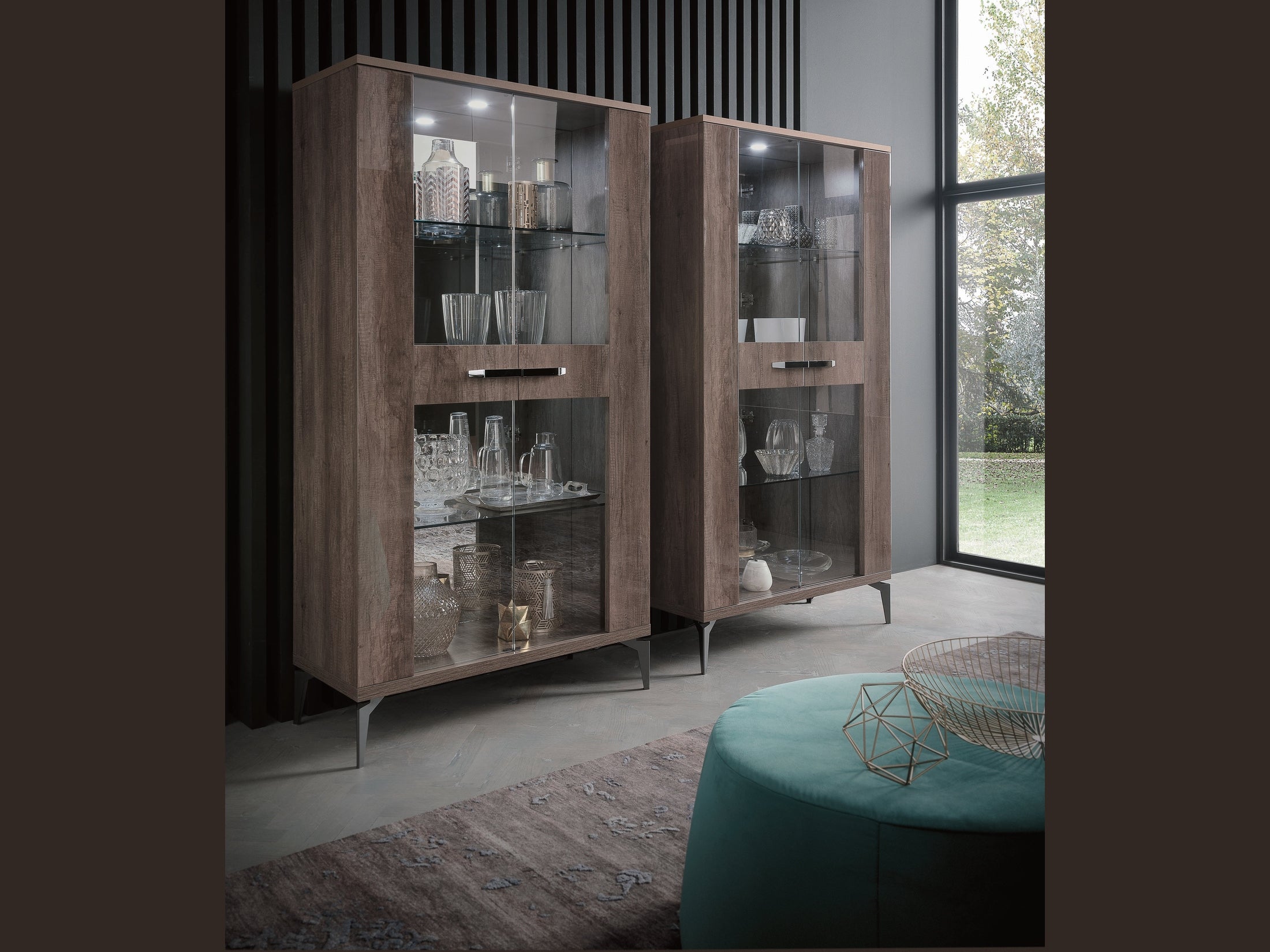 Two wooden display cabinets with glass doors in a modern room.