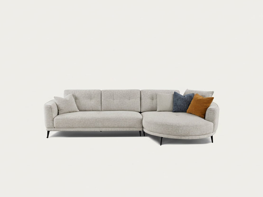 Rene sectional sofa with two cushions on a white background.