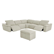 Vanessa 6-pc beige sectional sofa with ottoman on a gray background.