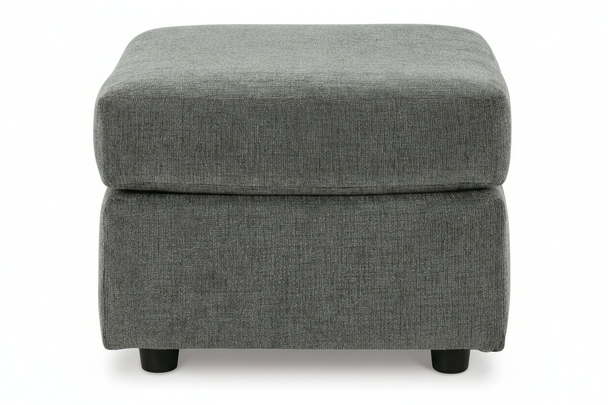 Gray upholstered ottoman on a white background