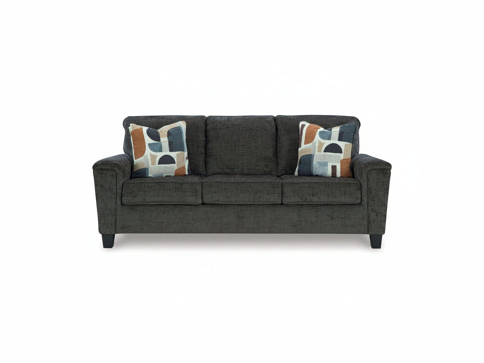 Gray sofa with patterned cushions on a white background