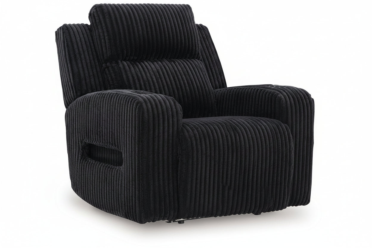 Black corduroy armchair on a white background