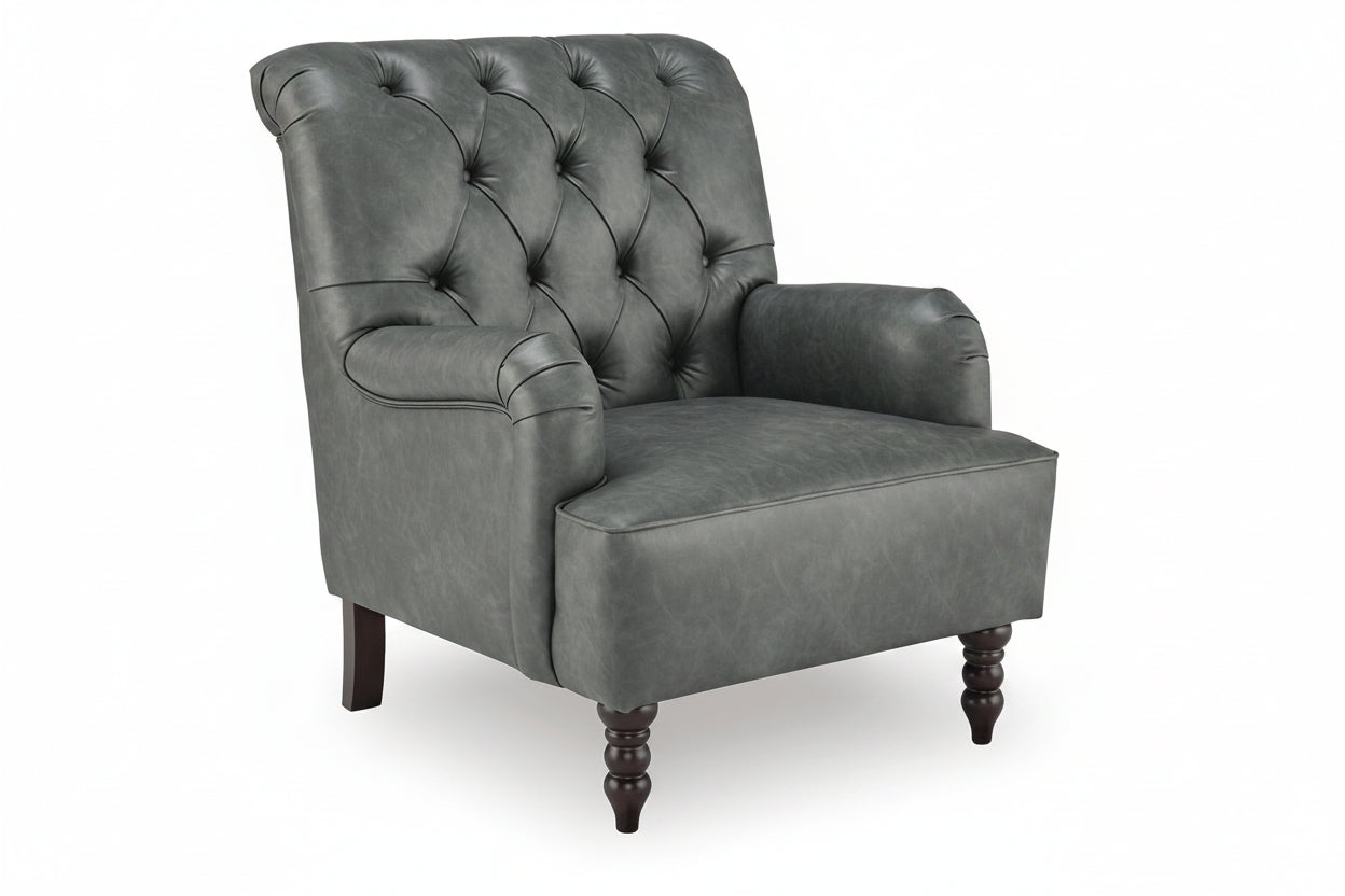 A gray tufted armchair with dark wooden legs, shown from a three-quarter angle on a white background.