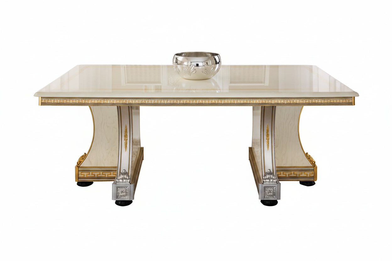 Decorative table with gold accents on a white background