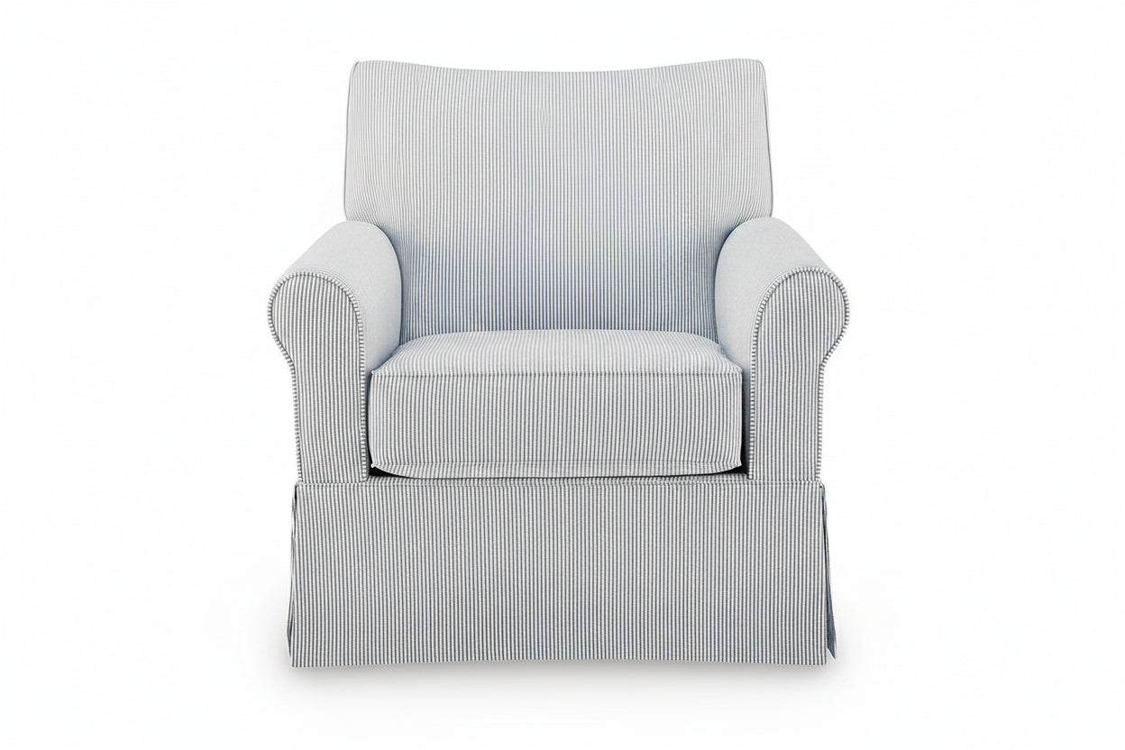 A classic armchair upholstered in a light gray and white vertically striped corduroy fabric, featuring a skirted base and nailhead trim on the arms, shown against a plain white background.