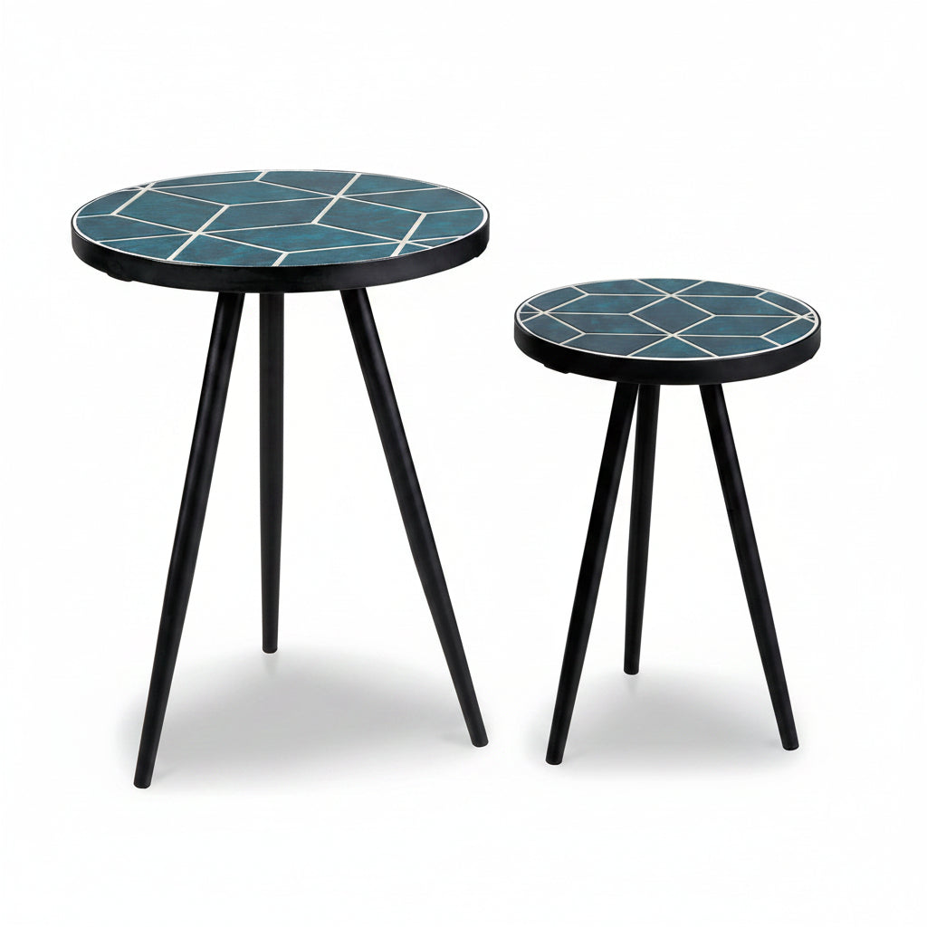Two Clairbelle round side tables with blue geometric patterned tops on a white background.