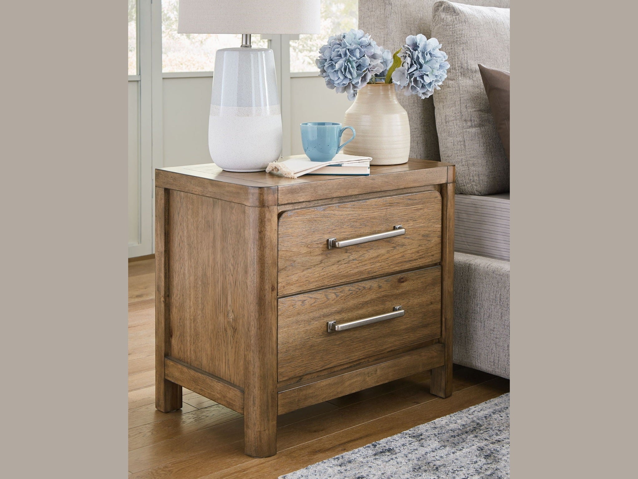 Cabalynn - Two Drawer Night Stand - Light Brown