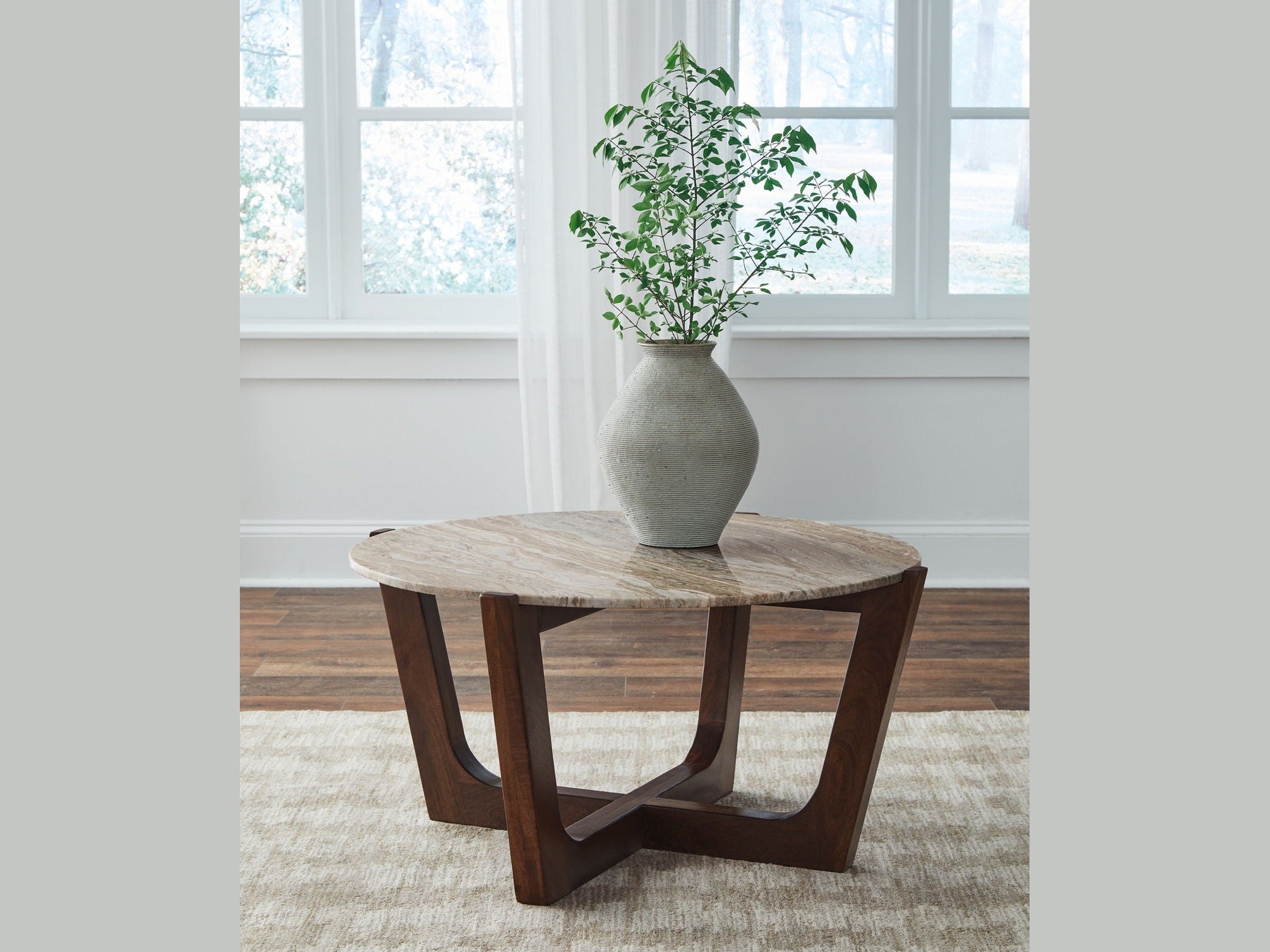 Tanidore - Round Cocktail Table - Warm Brown