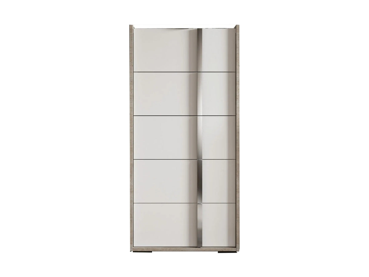 A modern tall chest of drawers with six horizontal drawers, featuring a brushed silver metallic finish and a central vertical handle, shown against a plain off-white background.