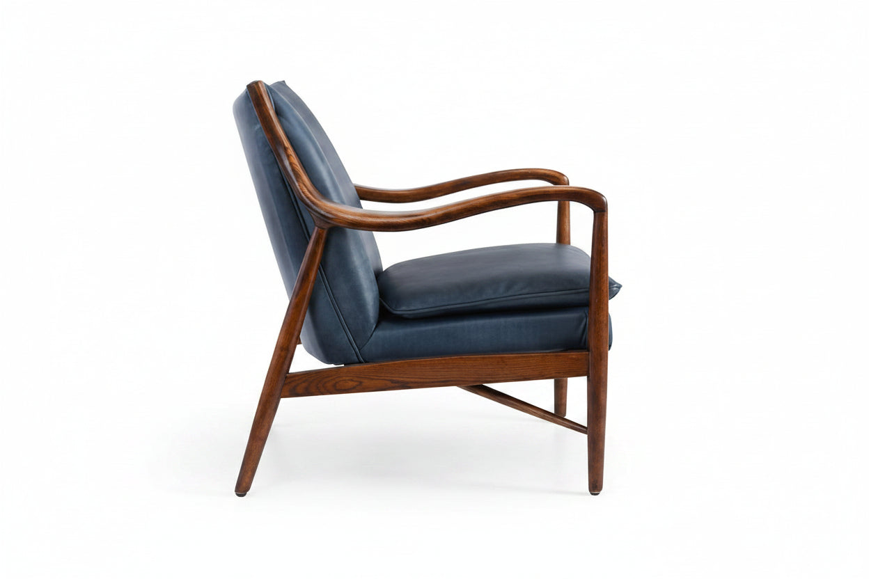 Blue armchair with wooden frame on a white background