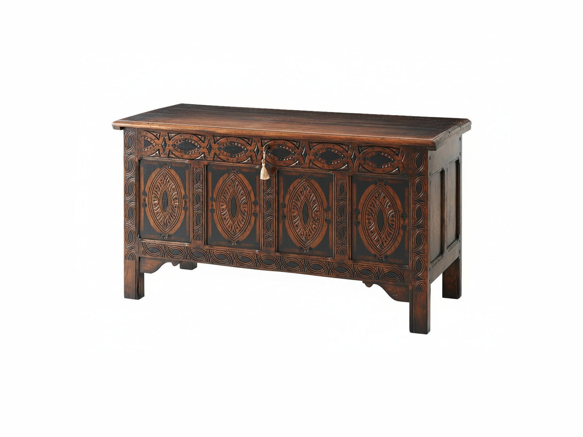 Wooden chest with intricate carvings on a white background