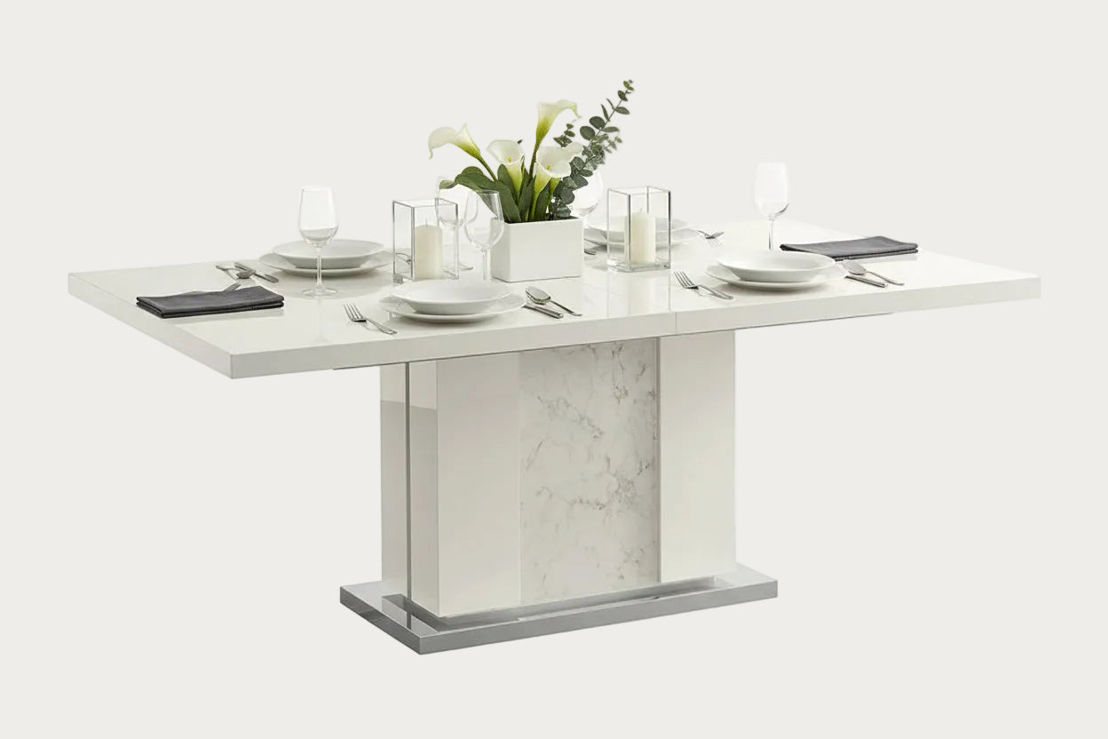Canova white dining table with marble-like base on a white background