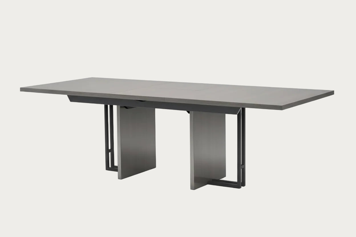 Novecento gray dining table with metal legs on a white background.