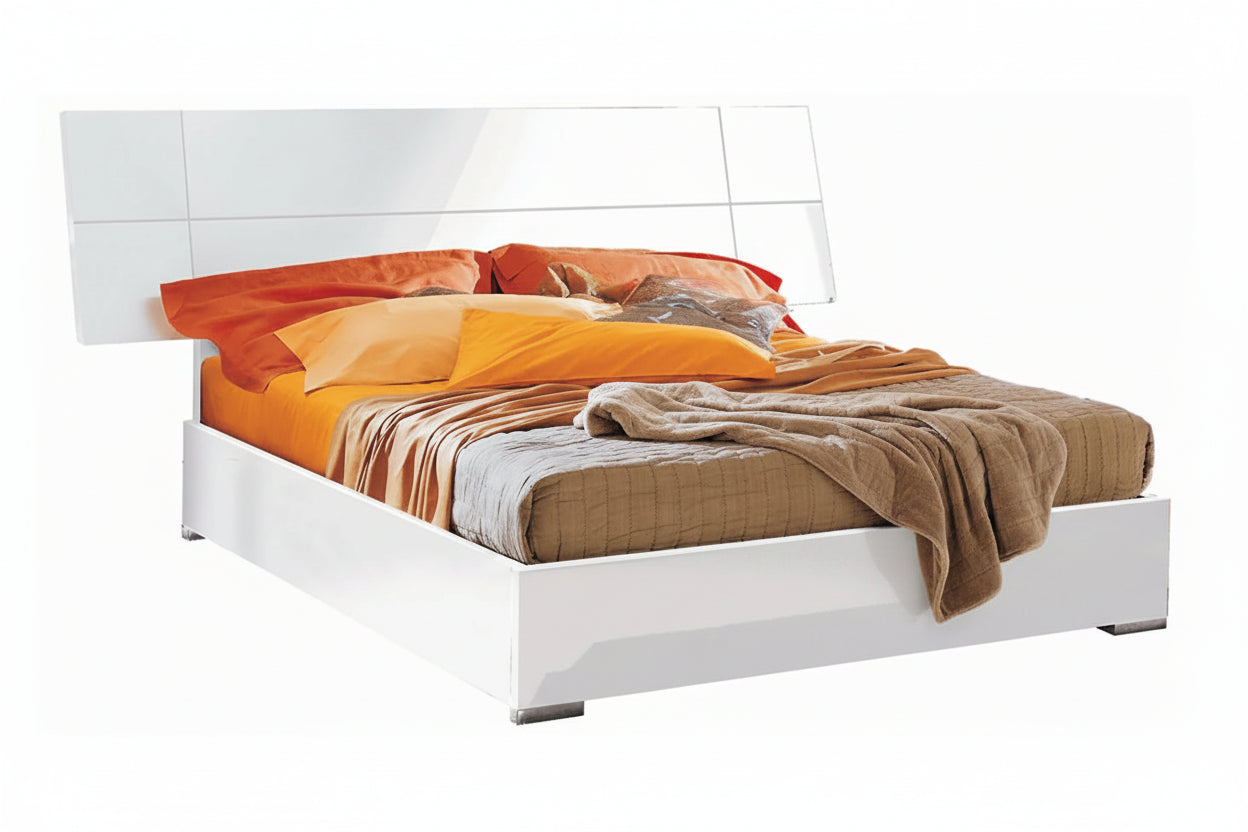 Asti white bed frame with colorful bedding on a white background