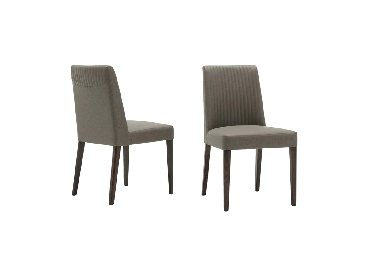 Two Jupiter gray chairs with black legs on a white background