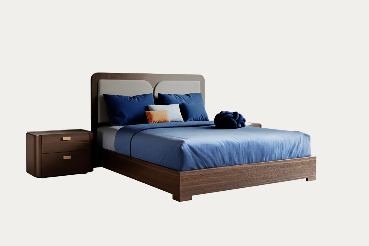 Appia modern bed and nightstand with blue bedding and pillows on a white background.