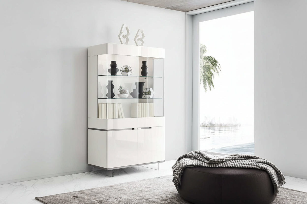 Artemide 2-door white display cabinet in a room with a large window and a beanbag chair.