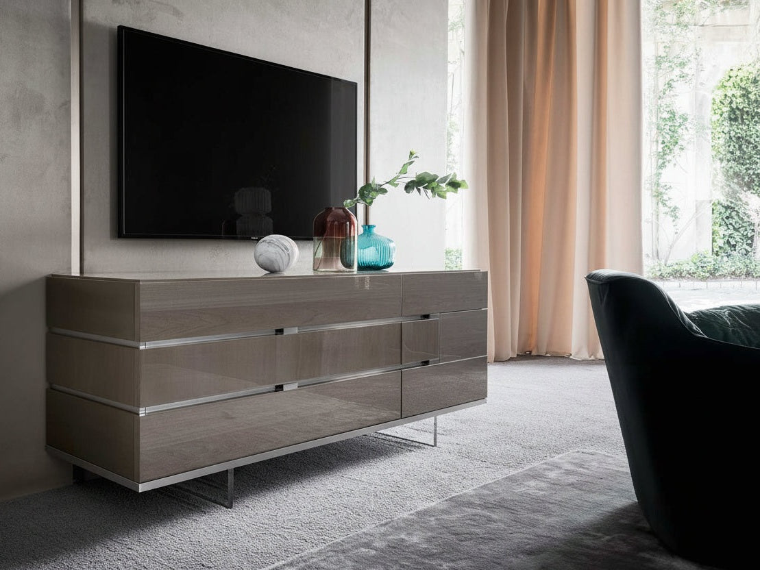 The Athena modern dresser in a living room setting with a television above it.