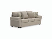 Sararose sofa with patterned cushions on a white background.