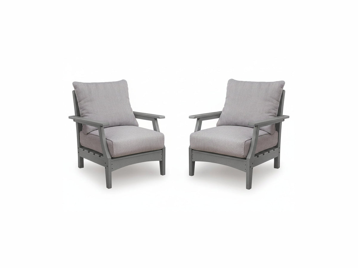 Two gray outdoor chairs with light gray cushions on a white background