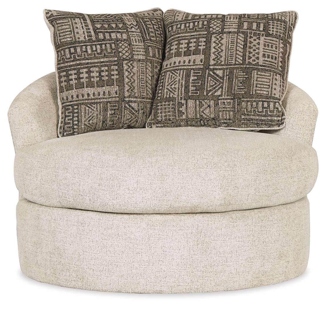 Beige swivel chair with patterned brown cushions on a white background