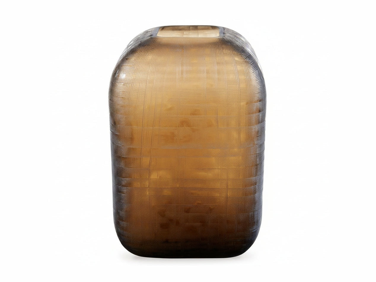 Decorative vase with ribbed texture on a white background