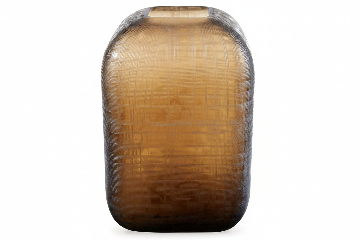 Decorative vase with ribbed texture on a white background