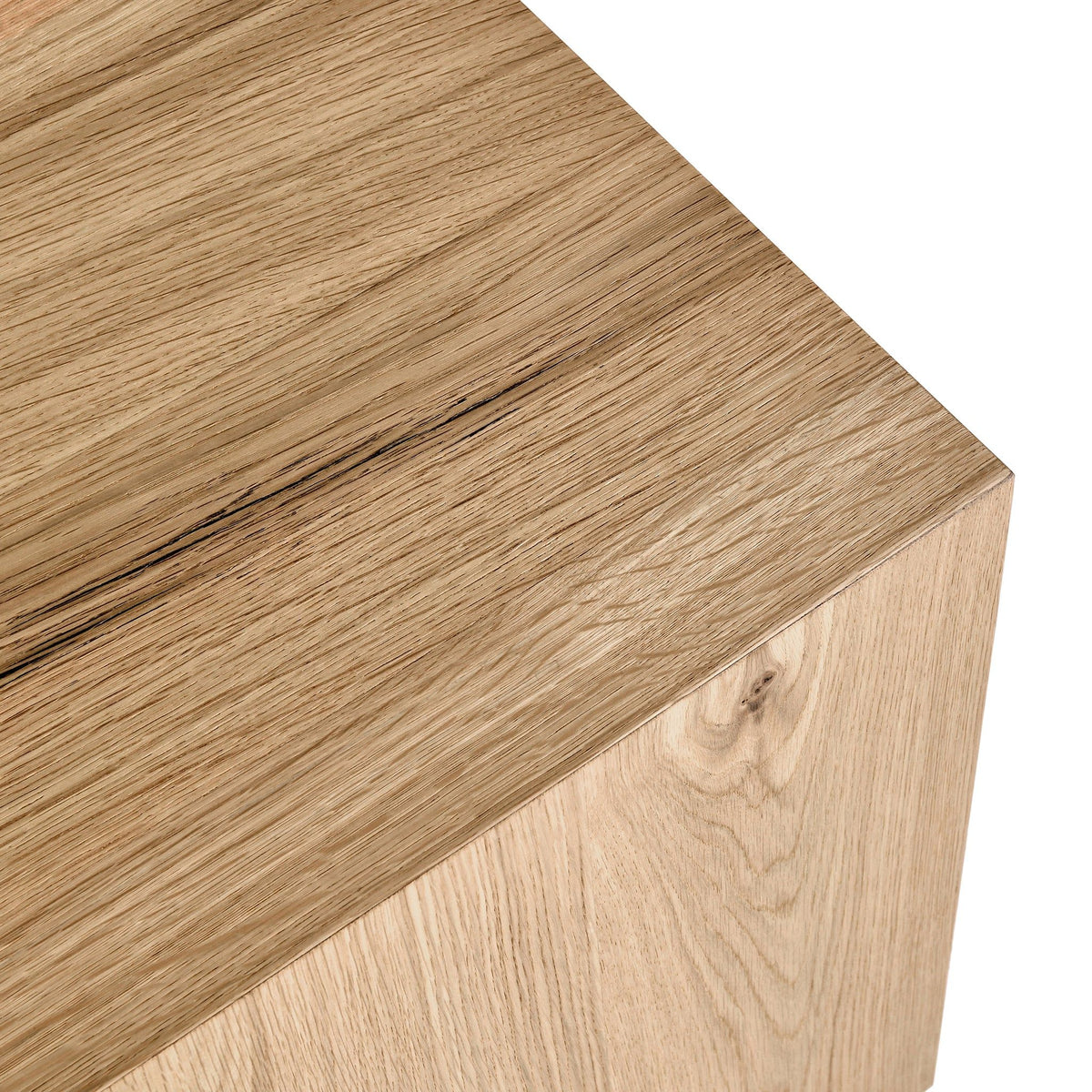 Close-up of a wooden surface with a visible grain pattern on a white background