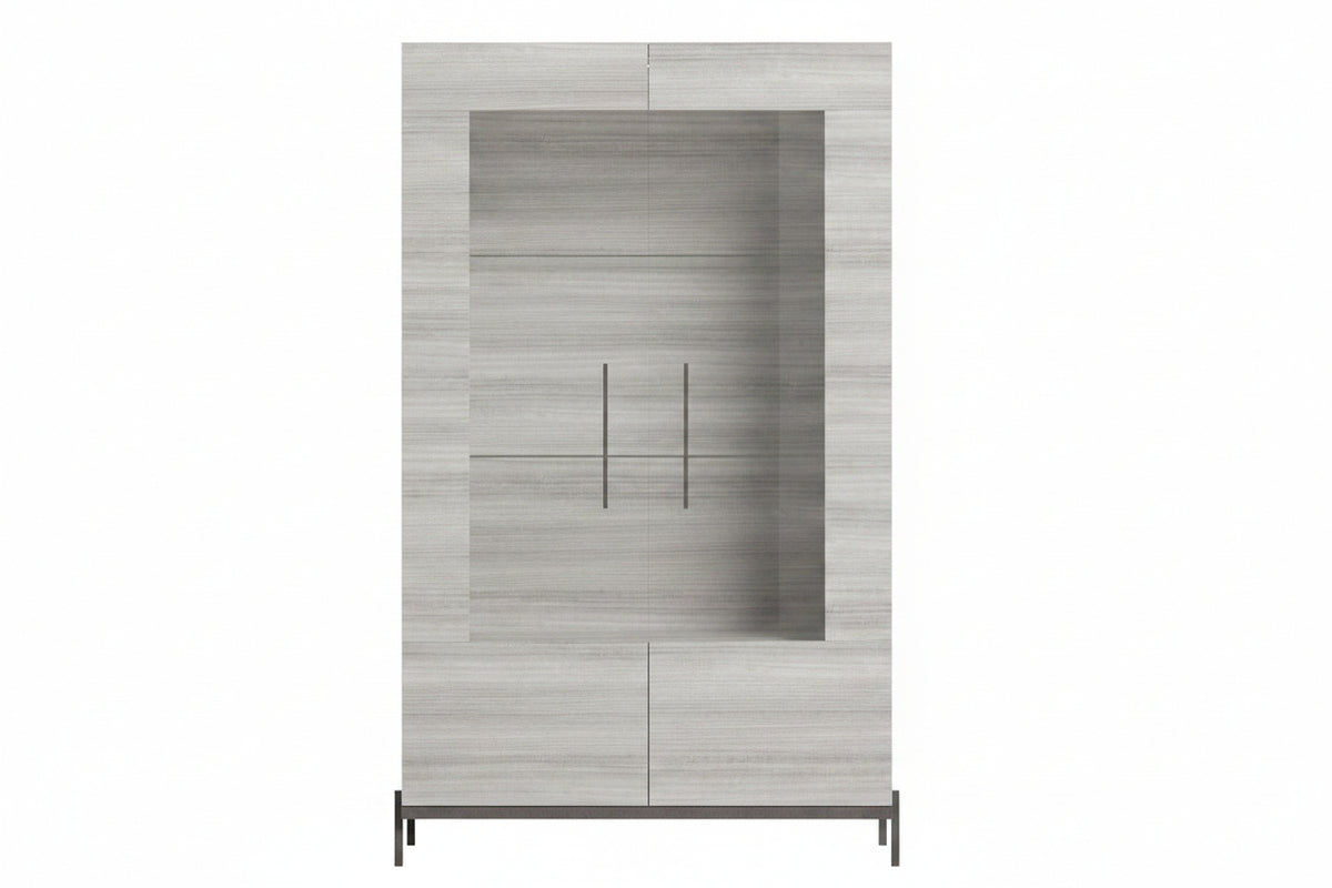 A tall modern cabinet with a light gray wood-grain finish, featuring a central recessed niche with two slim vertical handles and a dark metal base.