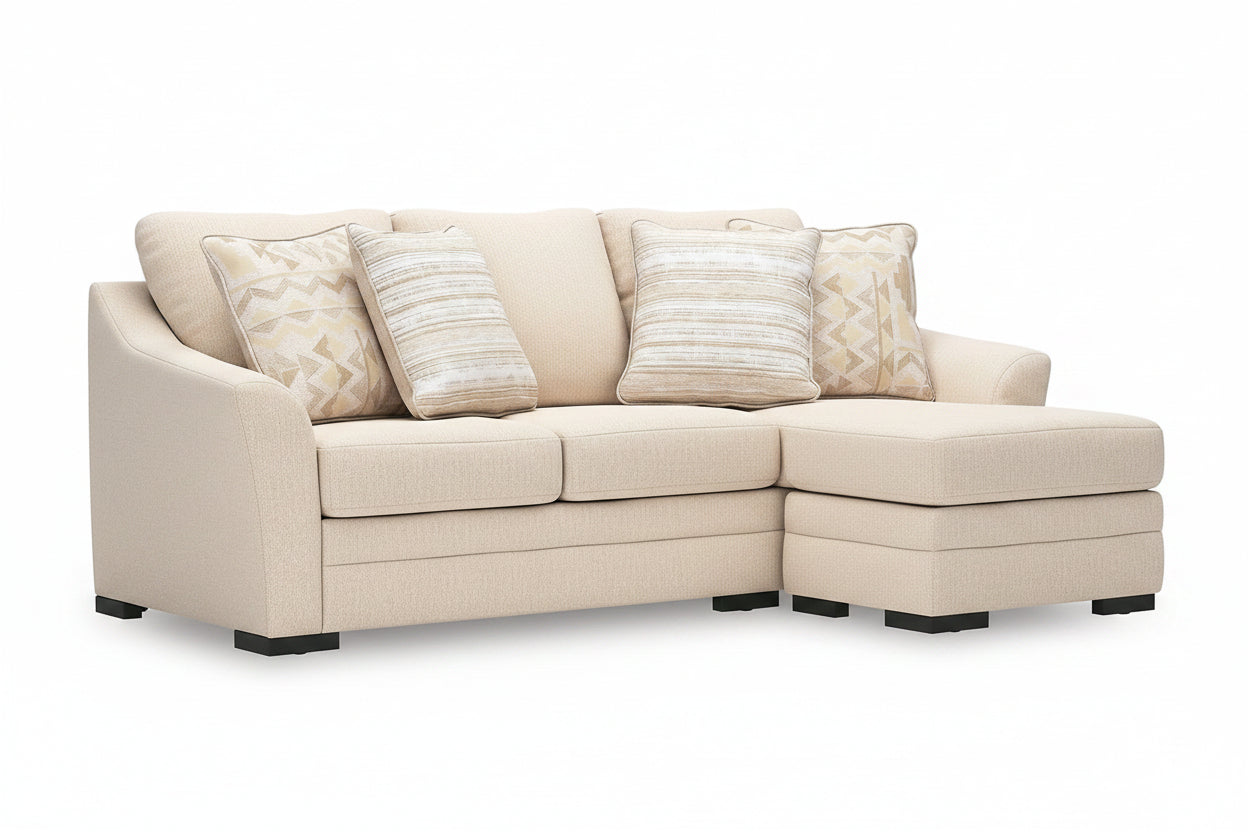 Lango beige sectional sofa with patterned cushions on a white background.