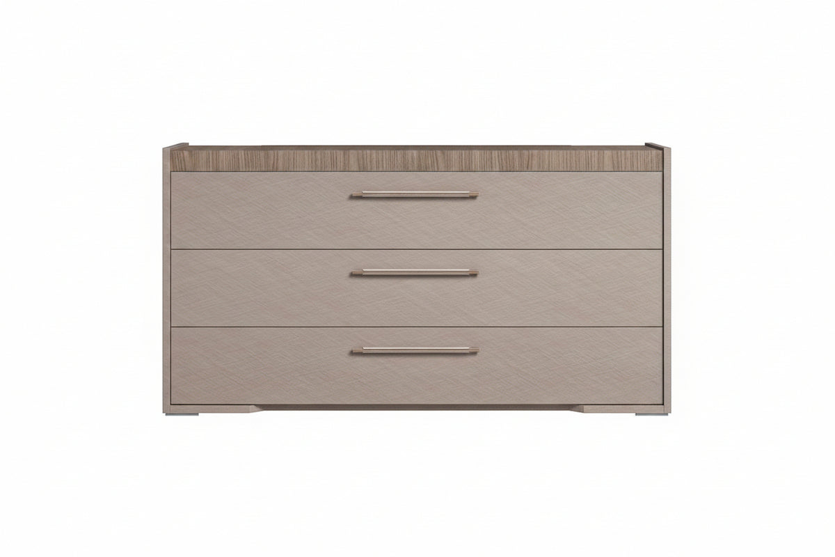A three-drawer chest of drawers with a light beige wood-grain finish and a darker brown wood-grain top, featuring slim horizontal metallic handles.