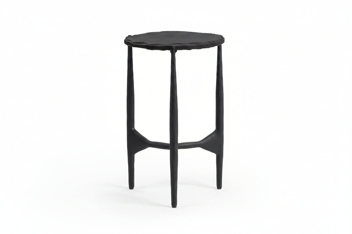 Black hexagonal side table on a white background