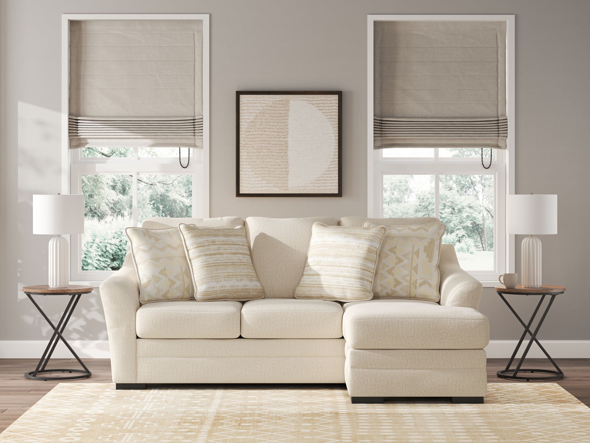 The Lango beige sofa with decorative pillows in a living room setting with neutral decor.