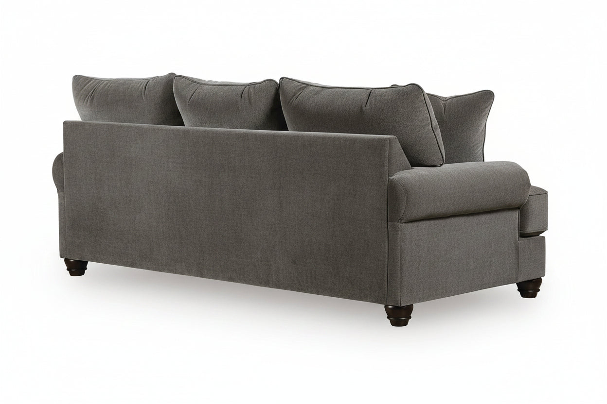 A gray upholstered loveseat or sofa shown from the back, featuring three back cushions, rolled arms, and dark wooden feet on a white background.