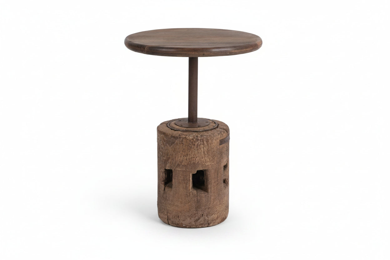 Wooden side table with cylindrical base on a white background