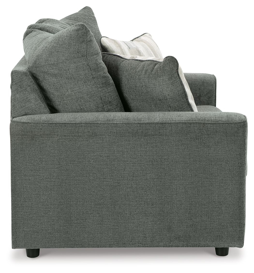 Gray sofa with cushions on a white background