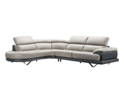 A modern two-tone gray leather L-shaped sectional sofa features adjustable headrests and sleek chrome legs for a contemporary living room.