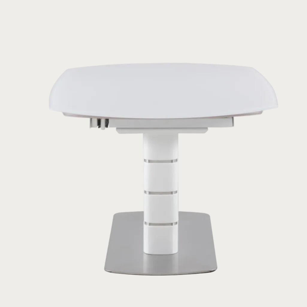 Charlotte round white table with a metallic base