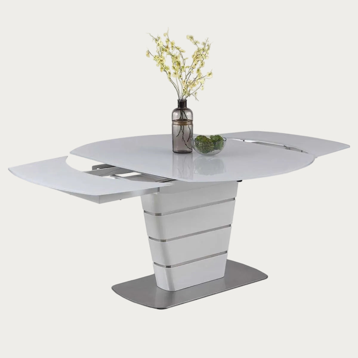Charlotte modern white dining table with a vase of flowers on a white background