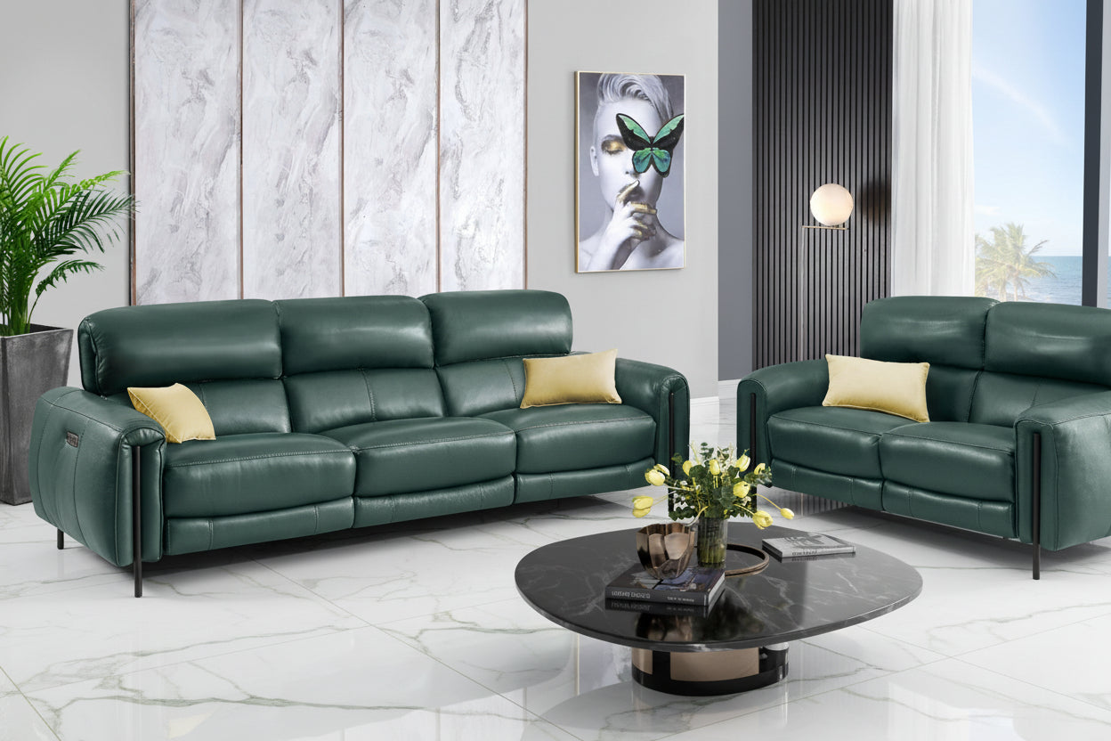 Charm sofa set in kelp leather in a modern living room with decor elements.