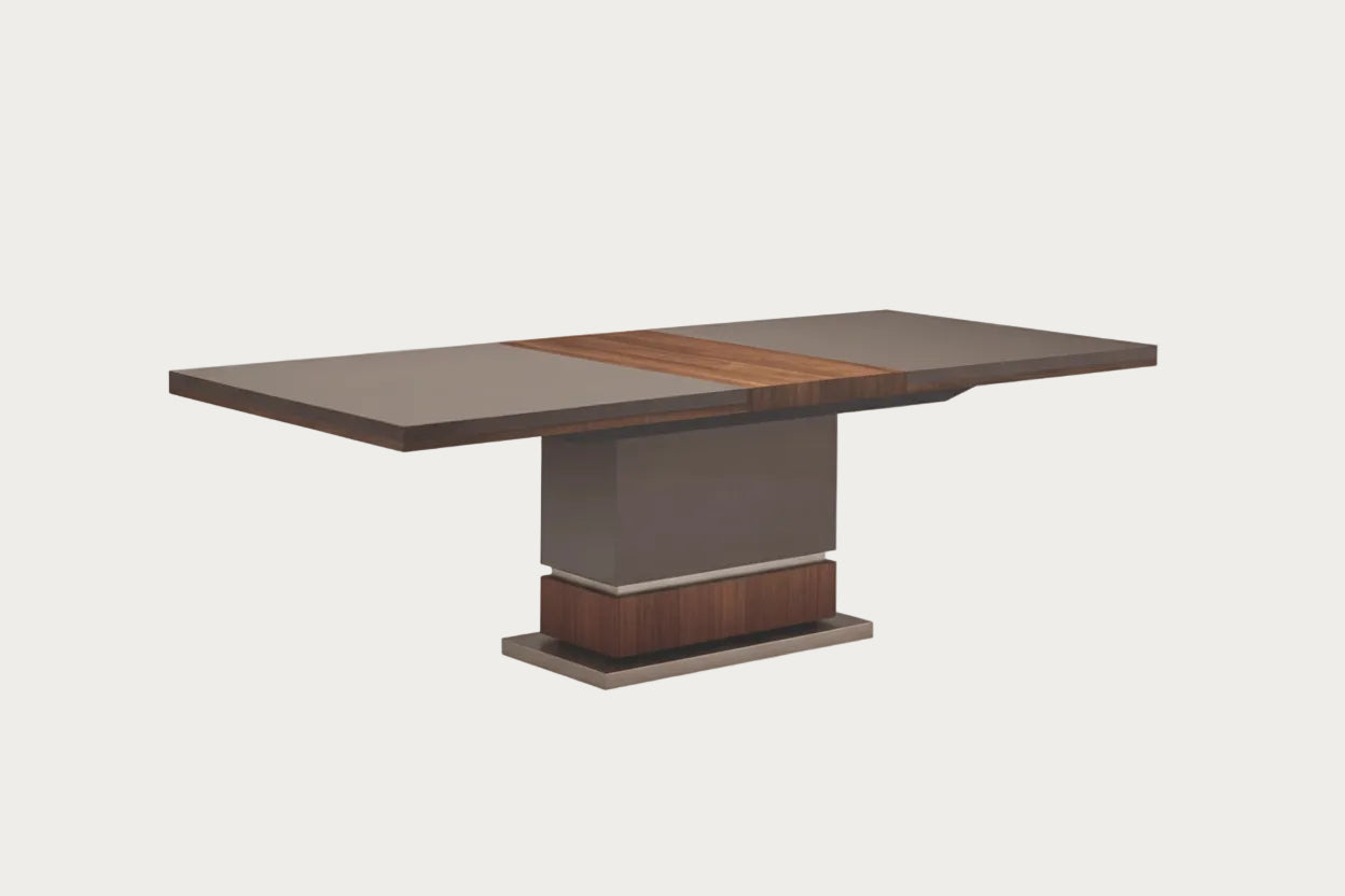 Corso Como dining table with a wooden top and base on a white background.