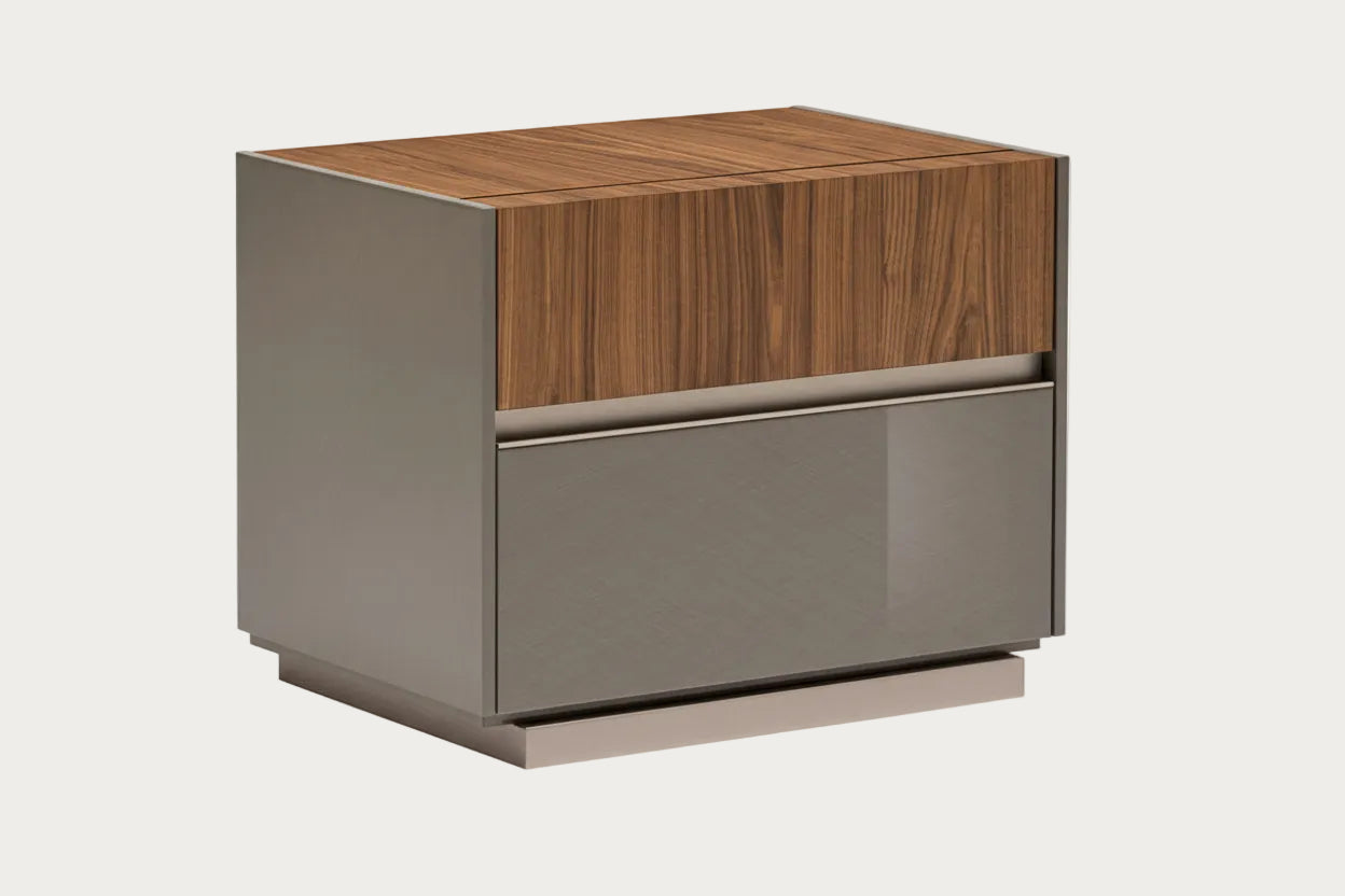 Corso Como Nightstand Two-toned nightstand with wooden top and metallic base on a white background.