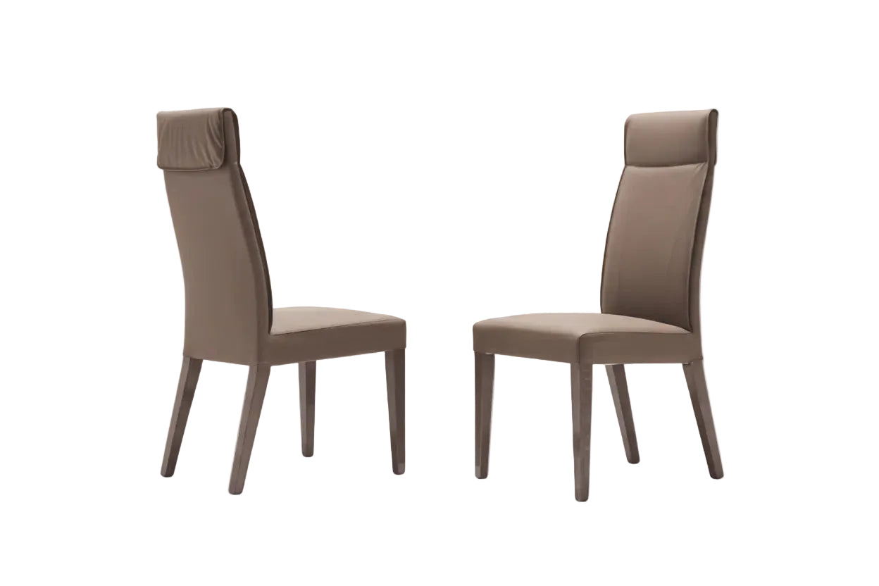 Corso Como: two brown chairs on a white background