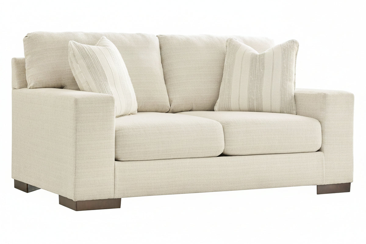 Beige sofa with wooden legs on a white background