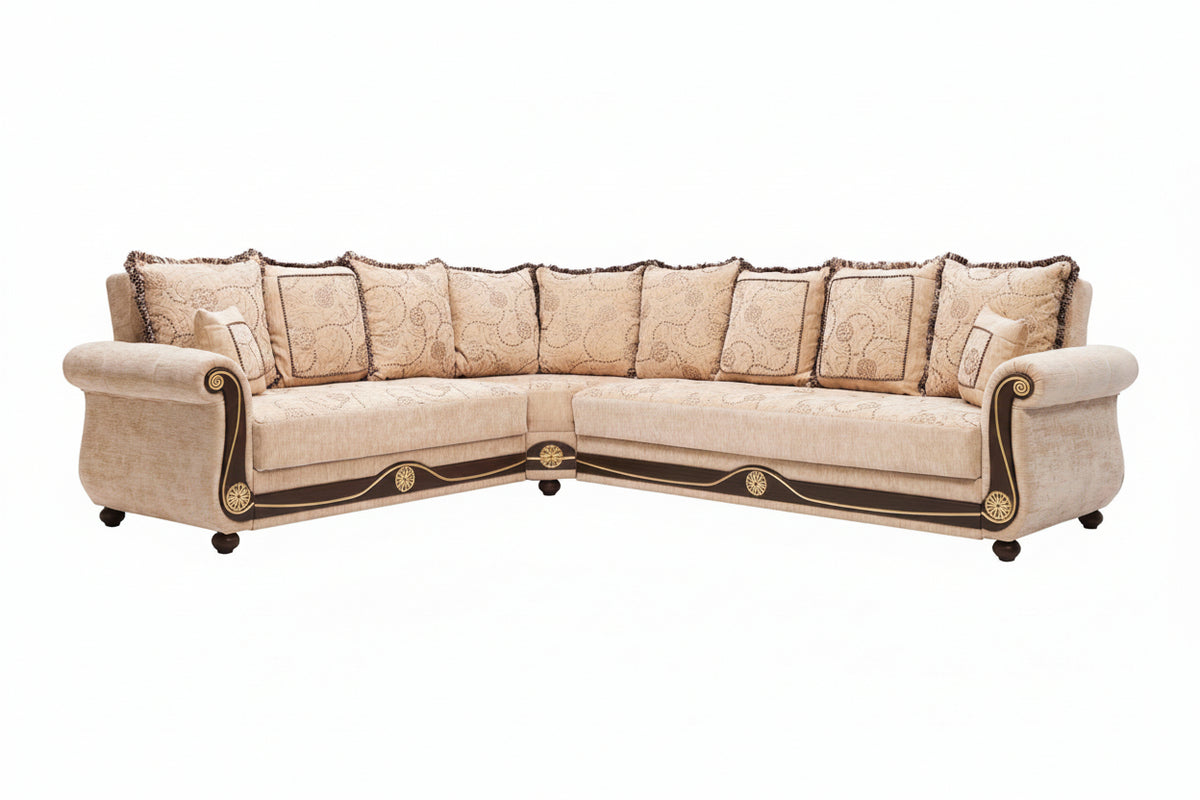 An elegant L-shaped sectional sofa upholstered in beige damask fabric with ornate dark wood trim and gold accents, shown against a plain white background.