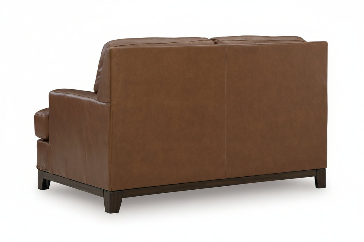Brown leather sofa on a white background