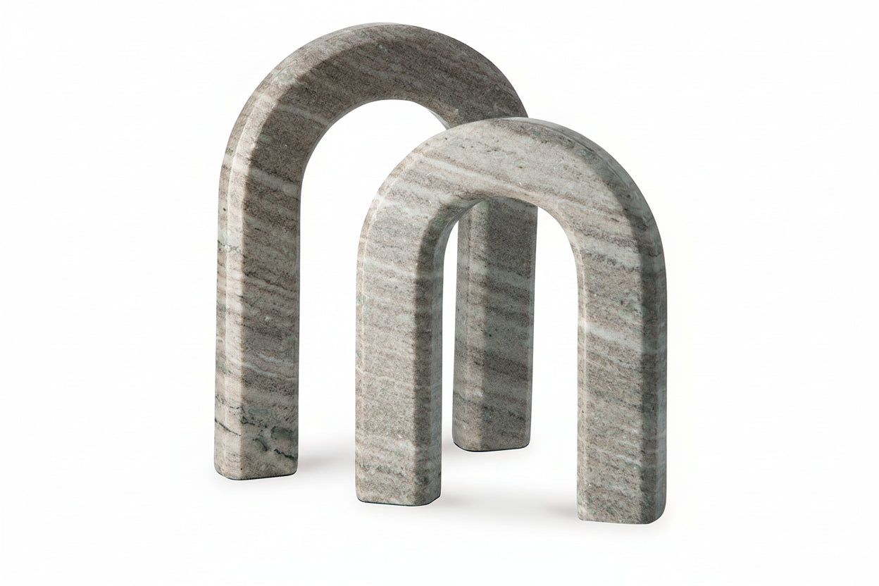 Two gray marble arches on a white background