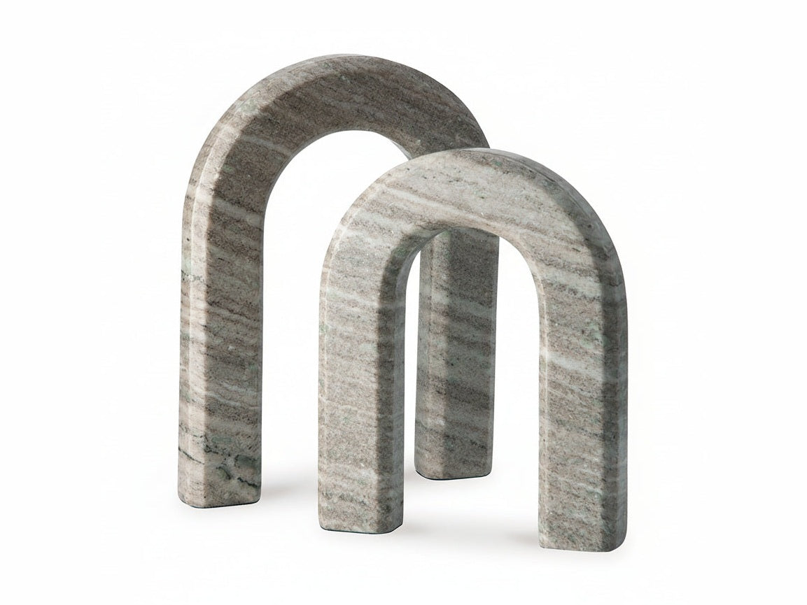 Two gray marble arches on a white background