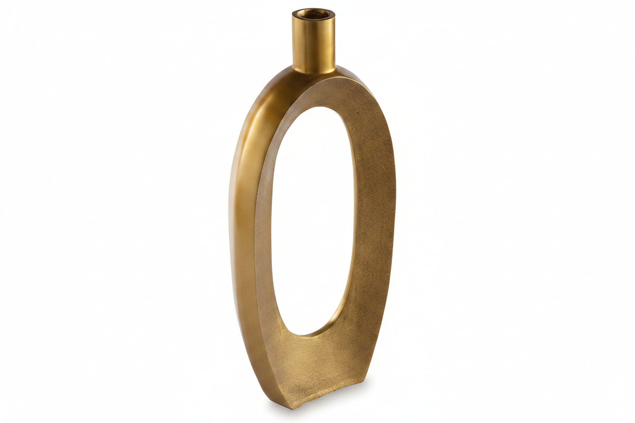 Gold vase with a modern design on a white background