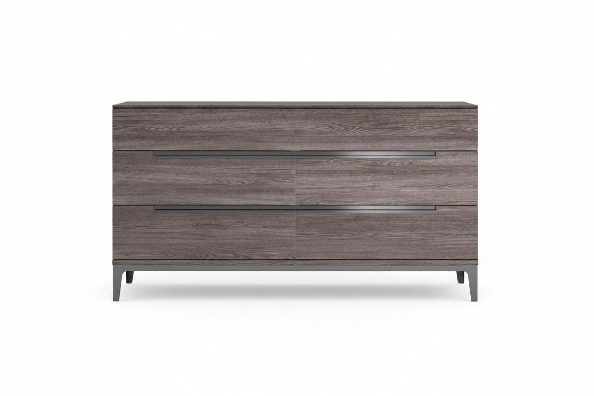 A modern three-drawer dresser with a gray-brown wood grain finish and slim dark metal handles, shown against a plain white background.